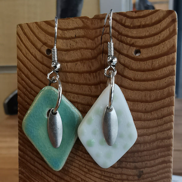 Boucles d'oreilles dépareillées