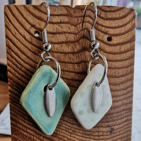 Boucles d'oreilles dépareillées