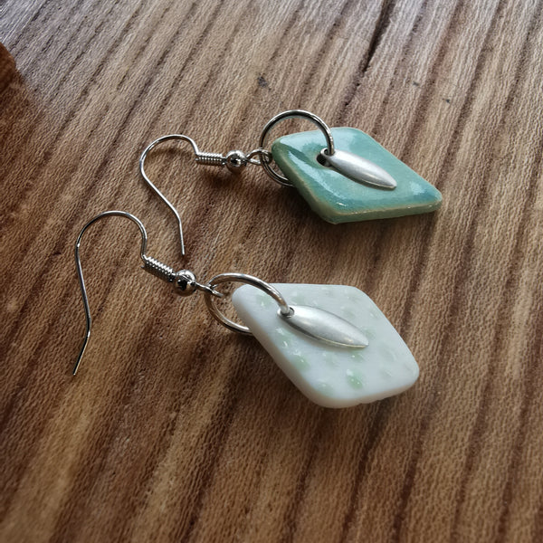 Boucles d'oreilles dépareillées