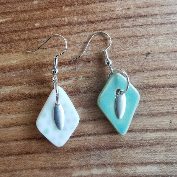 Boucles d'oreilles dépareillées