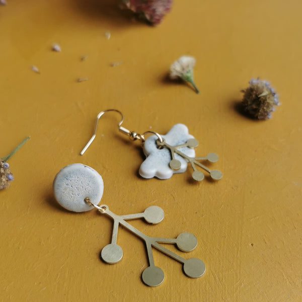 Boucles d'oreilles dépareillées